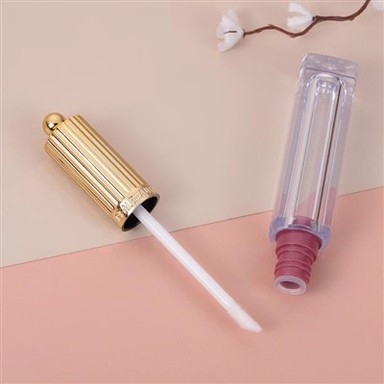 Plastikiniai lūpų blizgesio vamzdeliai